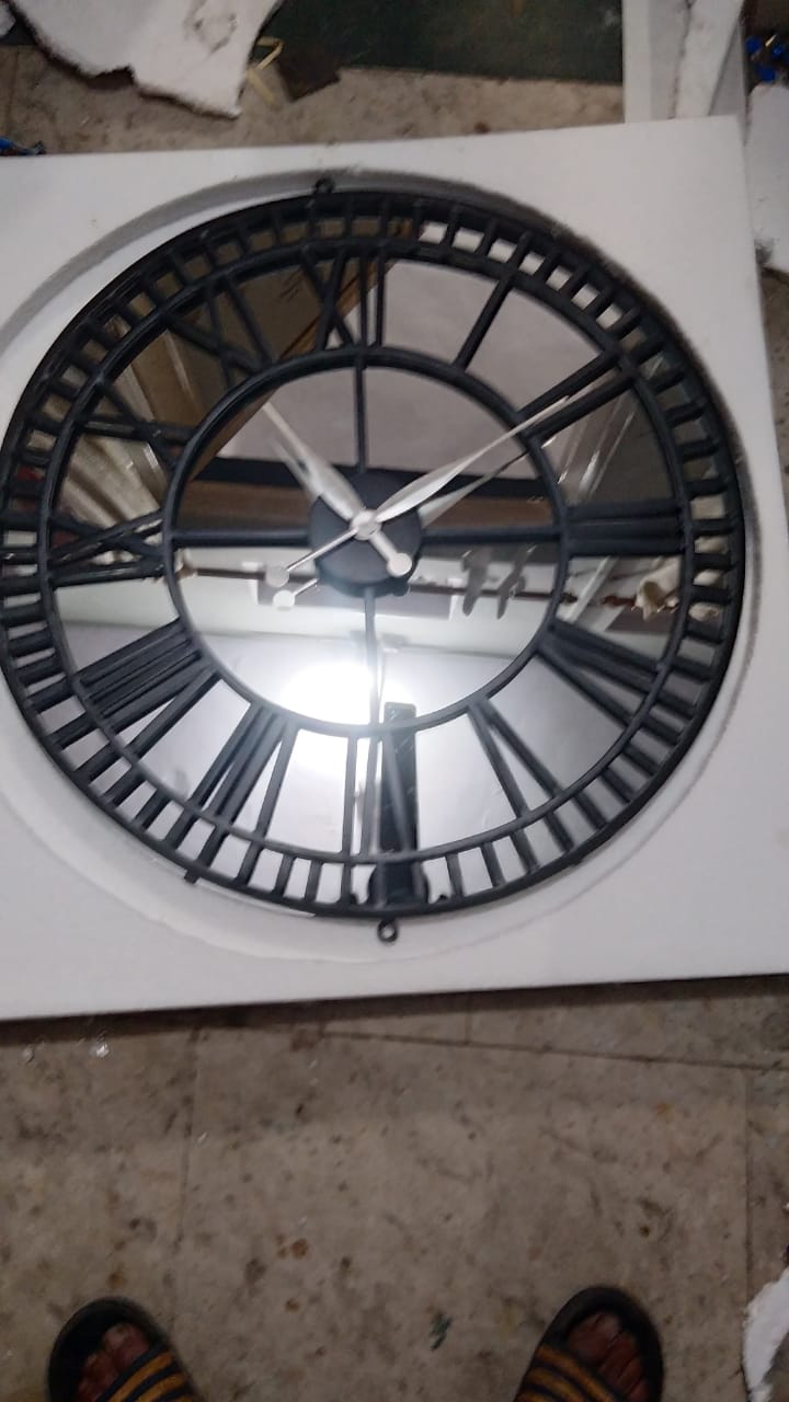 Round metal clock panel with mirror